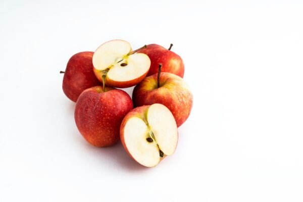 3 red apples on white background