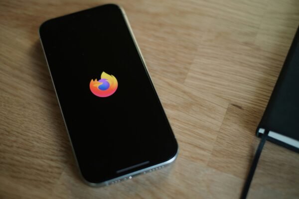 A close up of a cell phone on a table