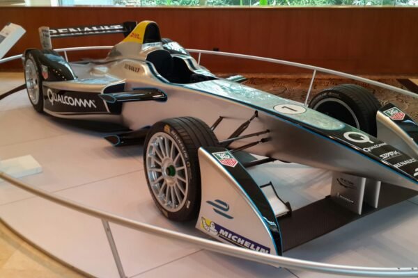 Silver formula e race car on display