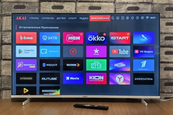 Smart TV screen displaying various application icons.