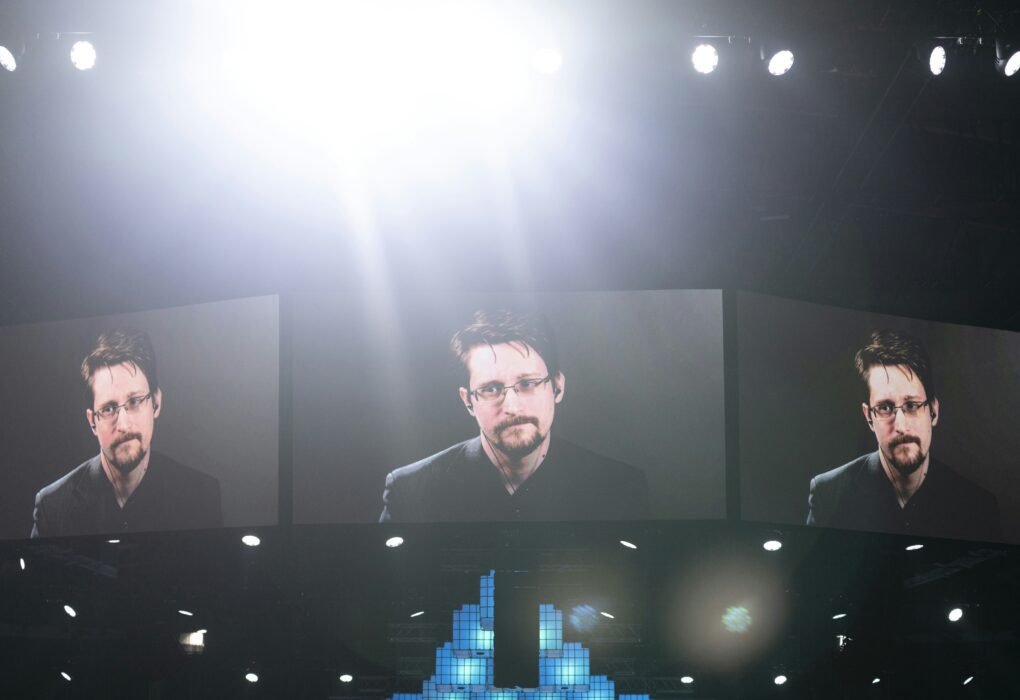 men's black suit on screen