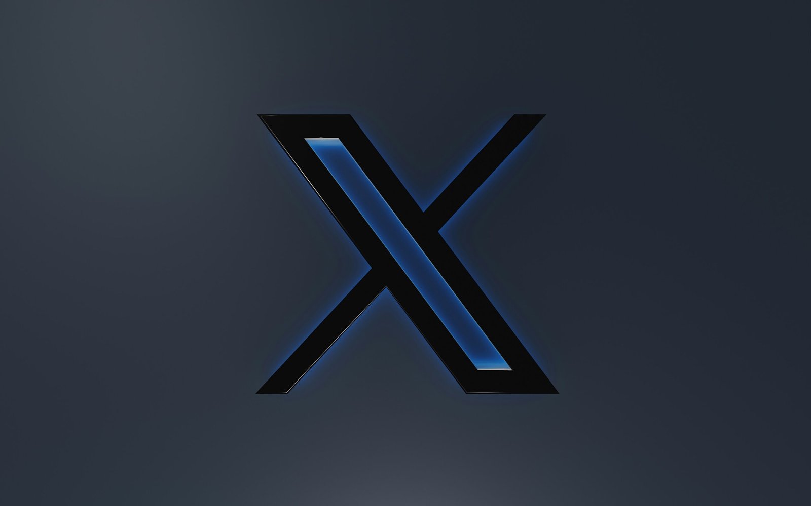 the letter x is illuminated in blue light