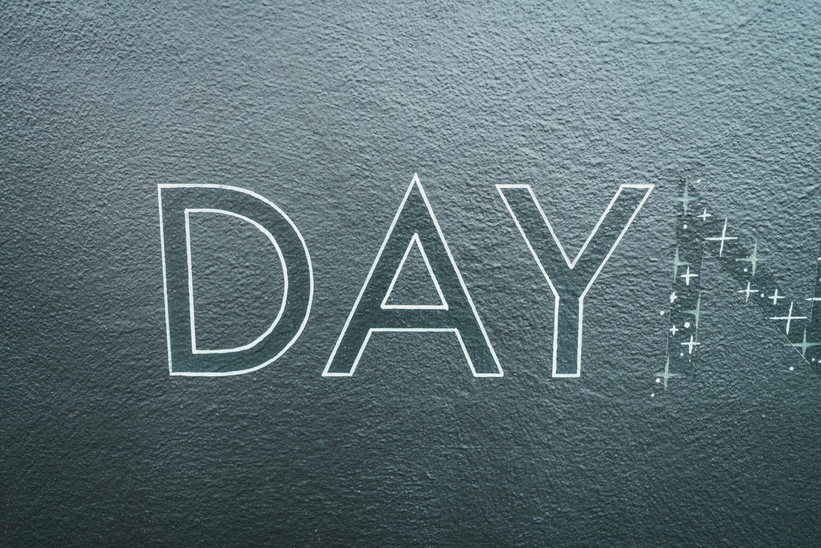 black leather textile with gold m