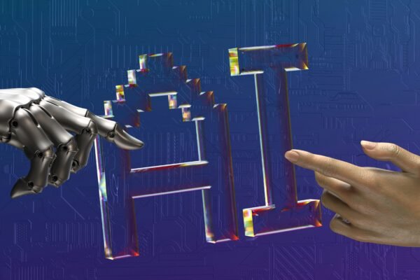 two hands touching each other in front of a blue background