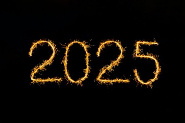 A black background with the number 2055 written in sparklers